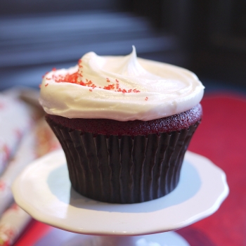A picture of a red velvet cupcake.